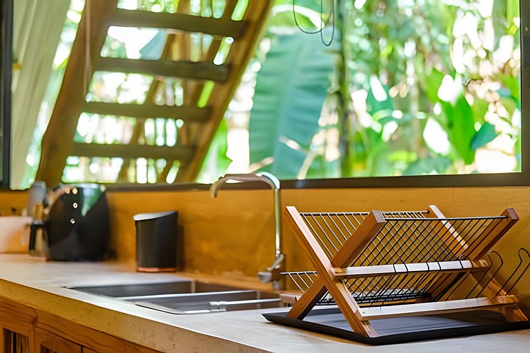 Casa na floresta com cachoeira na Aldeia Rizoma