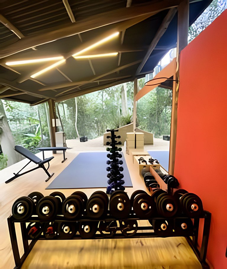 Casa na floresta com cachoeira na Aldeia Rizoma