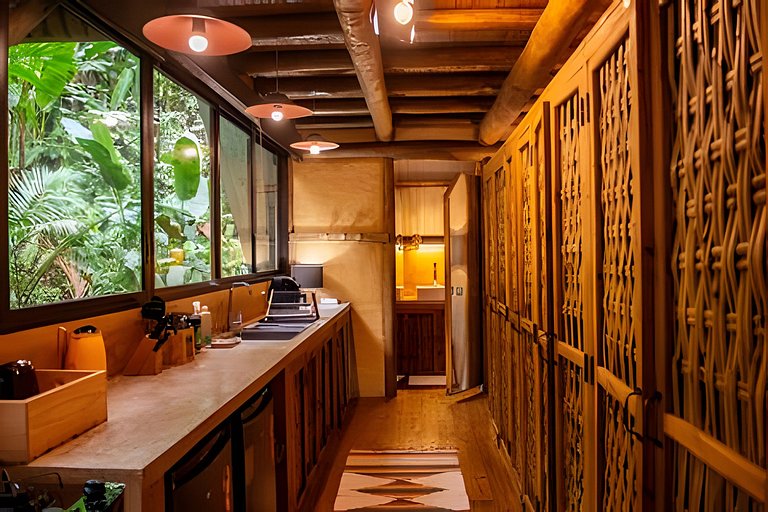 Casa na floresta com cachoeira na Aldeia Rizoma