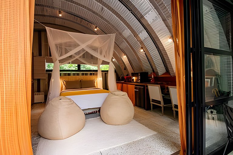 Refugio aconchegante na floresta Aldeia Rizoma