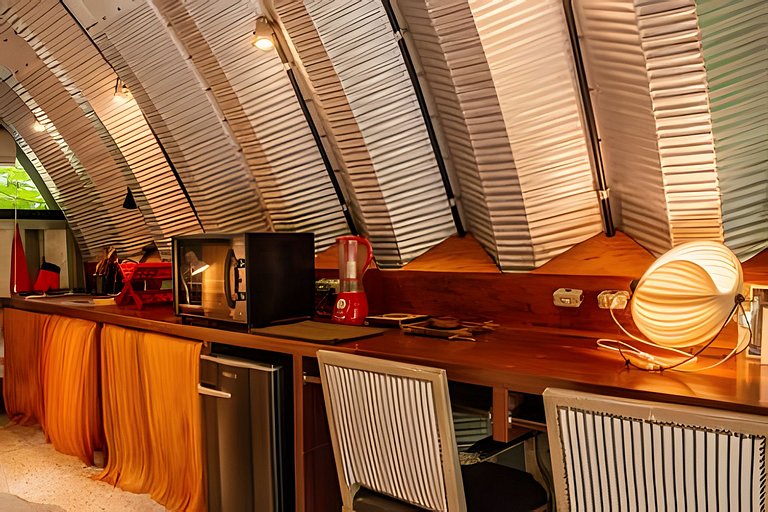 Refugio aconchegante na floresta Aldeia Rizoma