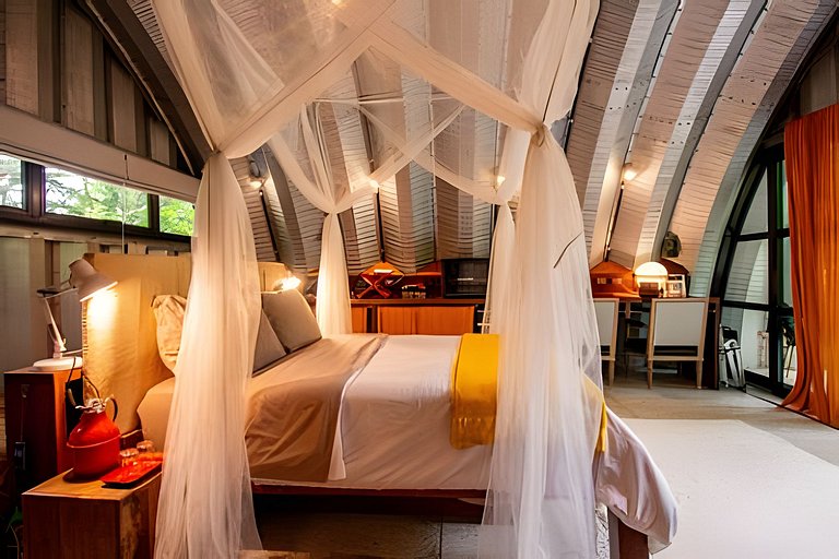 Refugio aconchegante na floresta Aldeia Rizoma