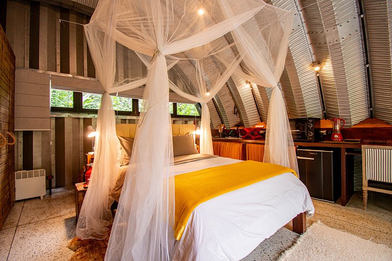 Refúgio aconchegante na Aldeia Rizoma