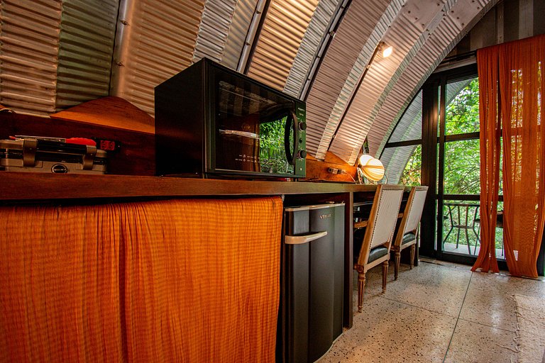 Refúgio aconchegante na Aldeia Rizoma