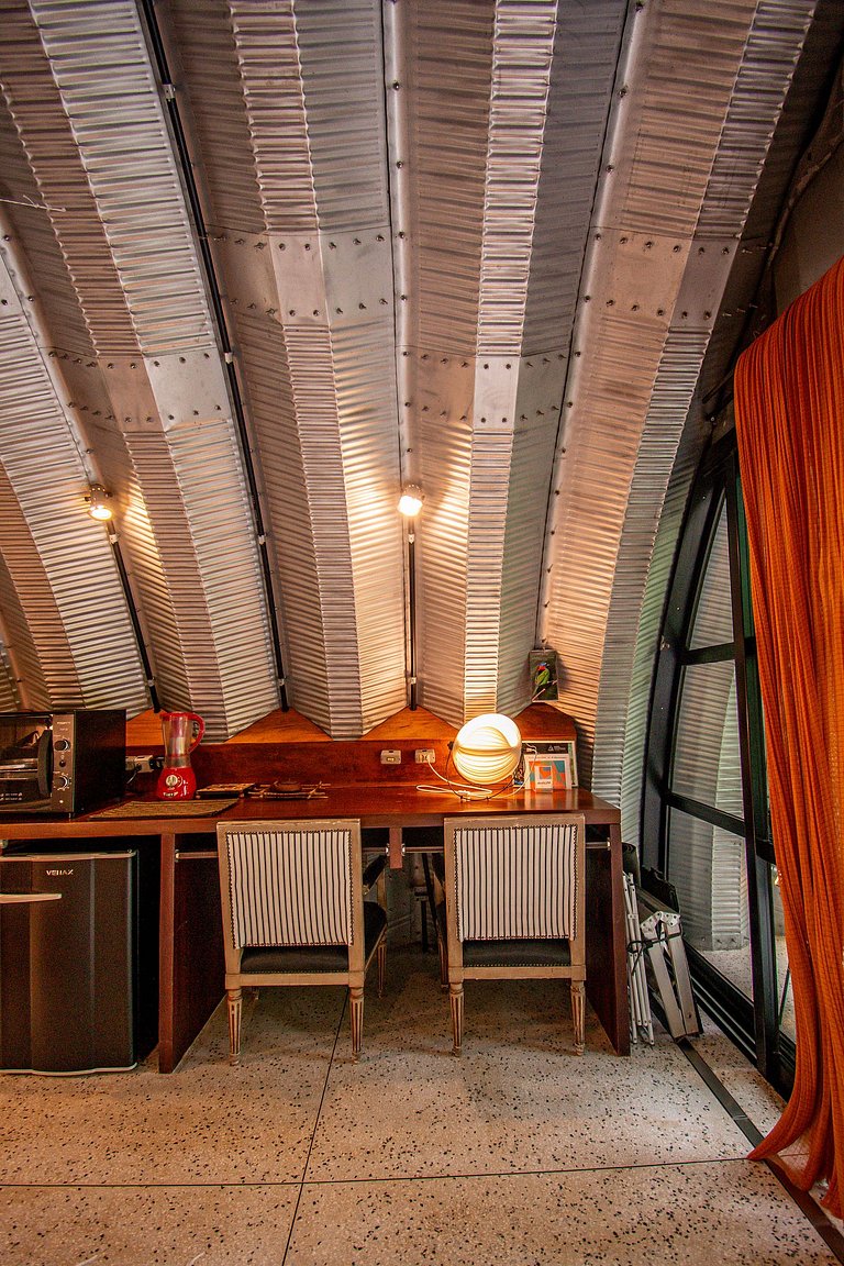 Refúgio aconchegante na Aldeia Rizoma