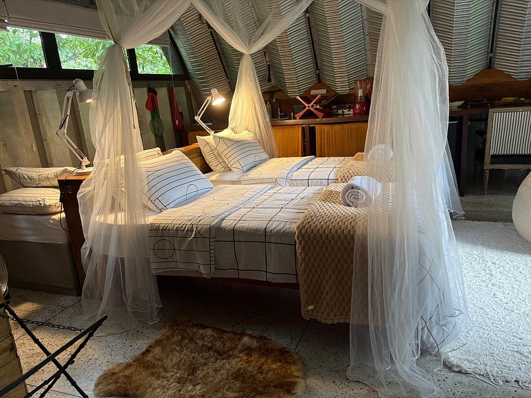 Refúgio aconchegante na Aldeia Rizoma